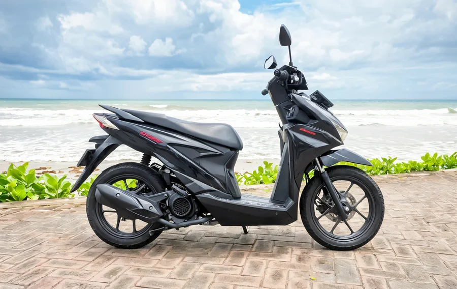Xe máy số tự động Honda Beat 110 thế hệ 2020 màu đen xám với thân bậc thang thon gọn và bánh xe 14 inch